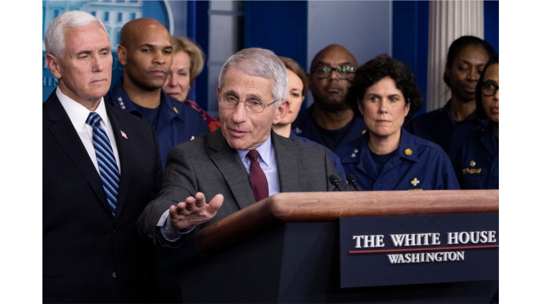 Dr. Anthony Fauci, director of the National Institute of Allergy and Infectious Diseases, with Vice President Mike Pence behind him, speaks during a briefing about the coronavirus in the James Brady Press Briefing Room of the White House, March 15, 2020,