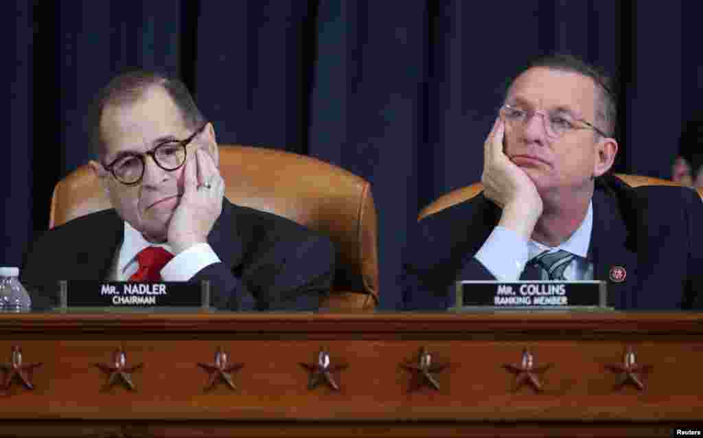 House Judiciary Committee Chairman Rep. Jerrold Nadler (D-NY) and ranking member Doug Collins (R-GA) listen to testimony as the committee holds a hearing to receive counsel presentations of evidence from the impeachment inquiry into U.S. President Donald Trump on Capitol Hill in Washington.