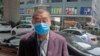 FILE - Pro-democracy media tycoon Jimmy Lai arrives at a police station in Hong Kong.