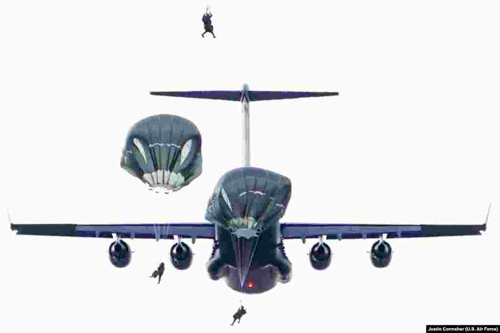Paratroopers assigned to the 4th Infantry Brigade Combat Team (Airborne), 25th Infantry Division of U.S. Army Alaska, conduct a parachute jump on Malemute drop zone at Joint Base Elmendorf-Richardson.