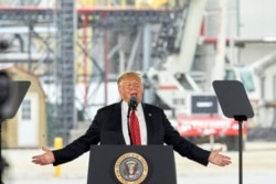 FILE - President Donald Trump speaks at Southwest Iowa Renewable Energy, an ethanol producer in Council Bluffs, Iowa, June 11, 2019. Trump has repeatedly told U.S. farmers he supports them and in return they largely continue to support him.