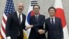 6일 서울에서 열린 북한 사이버 위협에 대응하기 위한 3차 실무그룹 회의에서 세스 베일리 미 국무부 대북특별부대표(왼쪽부터), 이준일 외교부 한반도정책국장, 구마가이 나오키 일본 외무성 사이버정책대사가 악수를 나누고 있다. 사진 = 한국 외교부 제공
