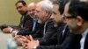 Iranian Foreign Minister Mohammad Javad Zarif, center, attends talks on Iran's nuclear program in Geneva on Nov. 22, 2013. 